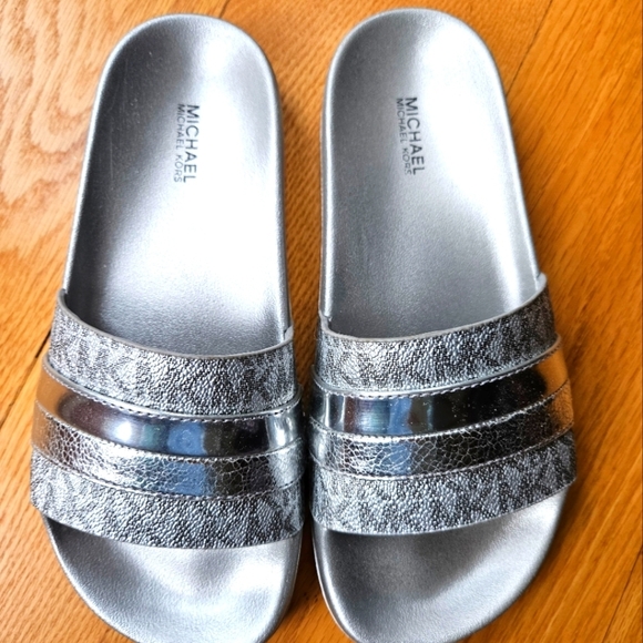 Michael Kors Shoes - Michael Kors Metallic Silver Brandy Slides NWB
